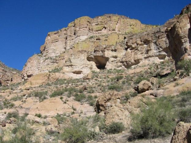 Skeleton Cave, a shallow cave at the base of a cliff in the Salt River Canyon near Canyon Lake, Arizona