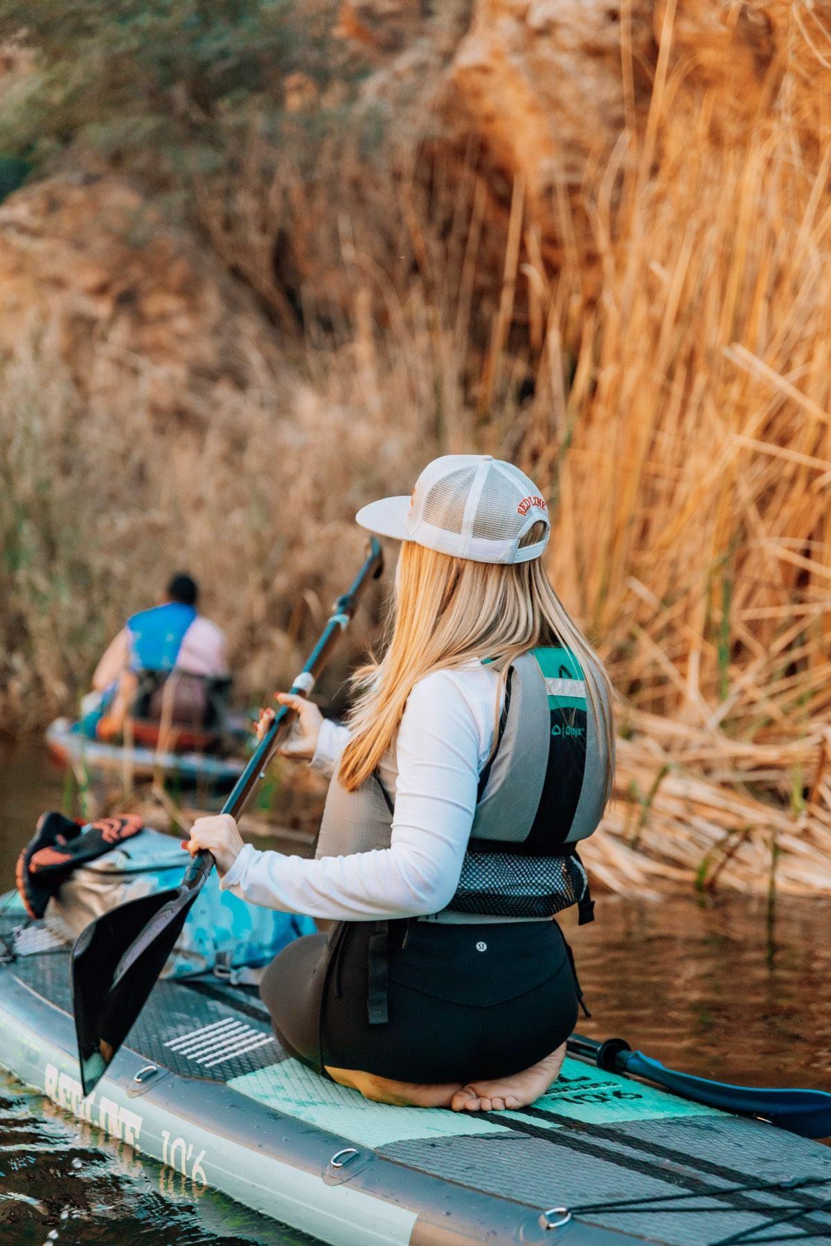 Paddling through reeds at Canyon Lake